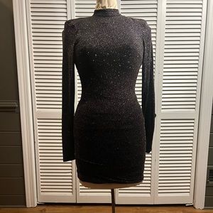Glittery body con dress with peep back